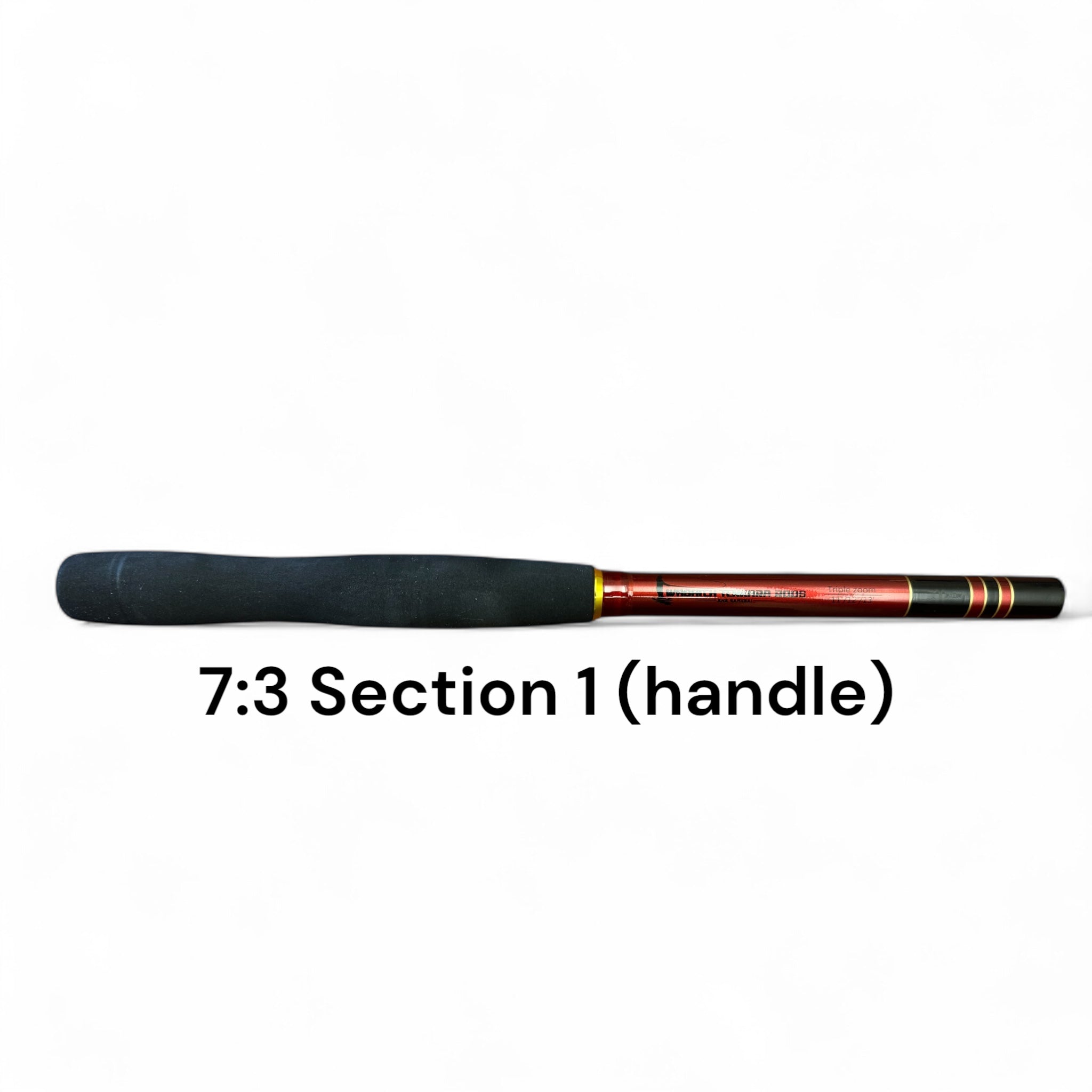 Close-up image of the Akai Samurai Tenkara Rod’s Section 1 handle with 7:3 action, featuring a black ergonomic grip and red carbon fiber body with gold accents.
