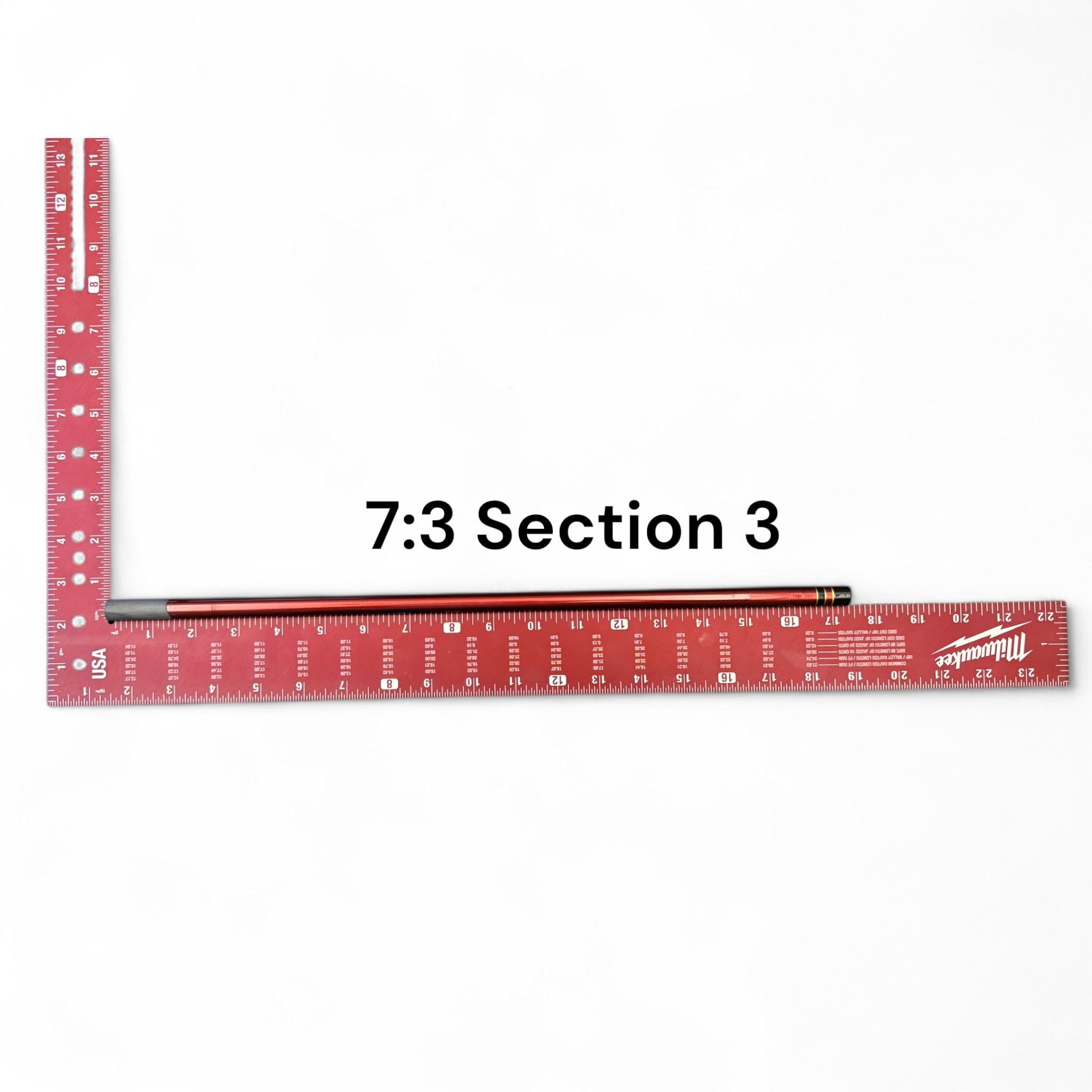 Image of the Akai Samurai Tenkara Rod’s Section 3 with 7:3 action, laid next to a red Milwaukee ruler for scale on a white background, labeled for identification.