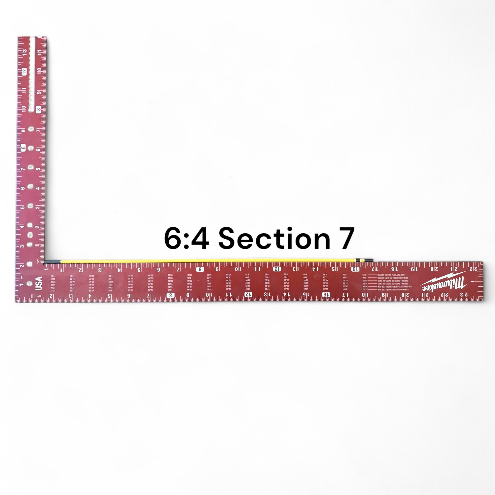 Section 7 of the Middle Fork 6:4 Tenkara Rod by Wasatch Tenkara Rods, displayed alongside a red measuring square for scale. The section features the rod’s yellow carbon fiber finish with brown accent bands.