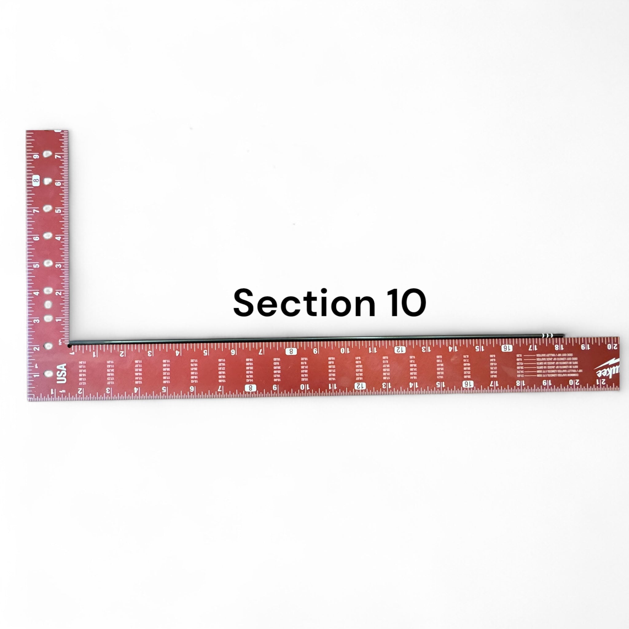 Replacement Section 10 for the Wasatch Tenkara Rods RodZilla, shown next to a red Milwaukee square ruler for scale—precision-engineered for a perfect fit and continued performance in multi-section tenkara rod setups.