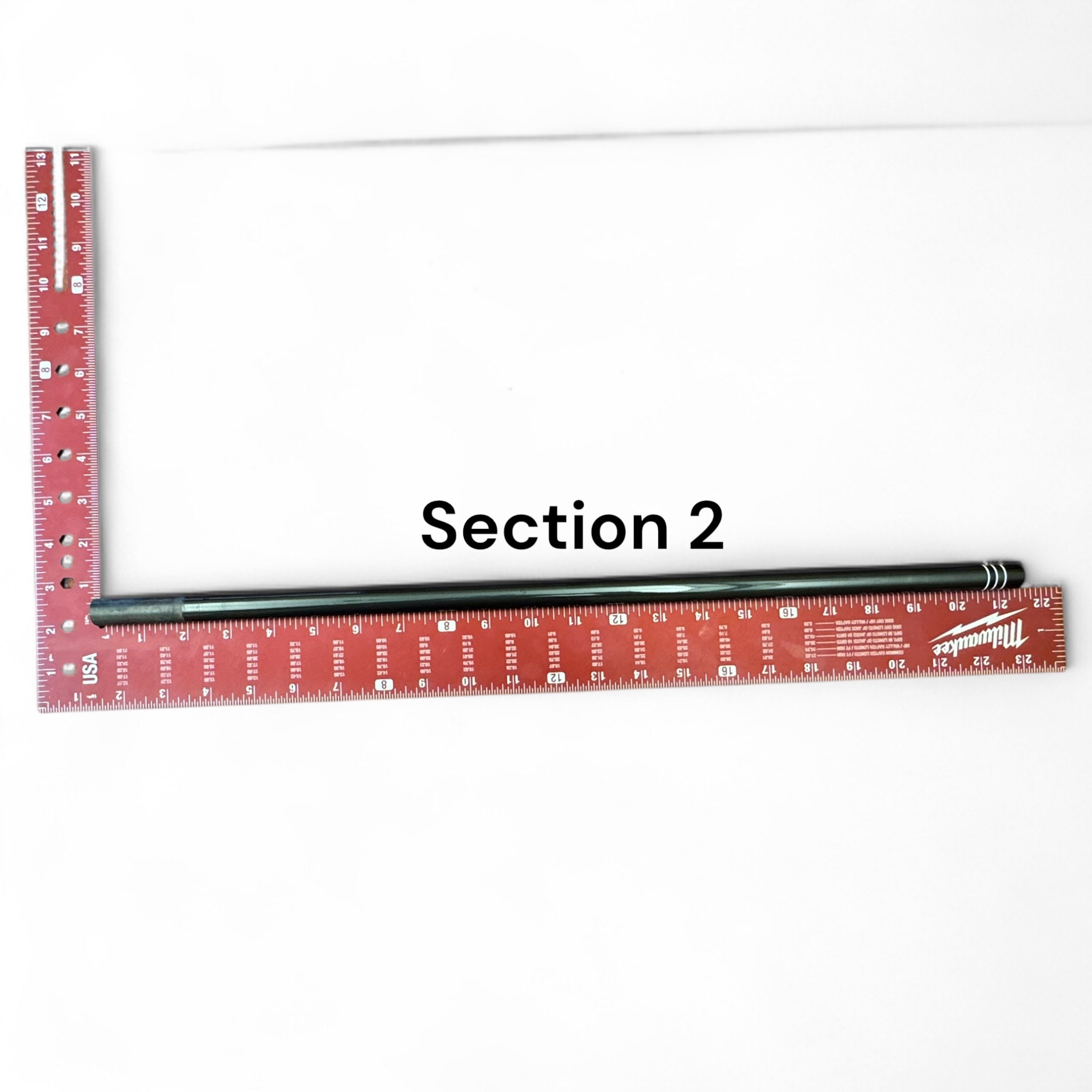 Replacement Section 2 for the Wasatch Tenkara Rods RodZilla, shown next to a red Milwaukee square ruler for scale—precision-engineered for a perfect fit and continued performance in multi-section tenkara rod setups.