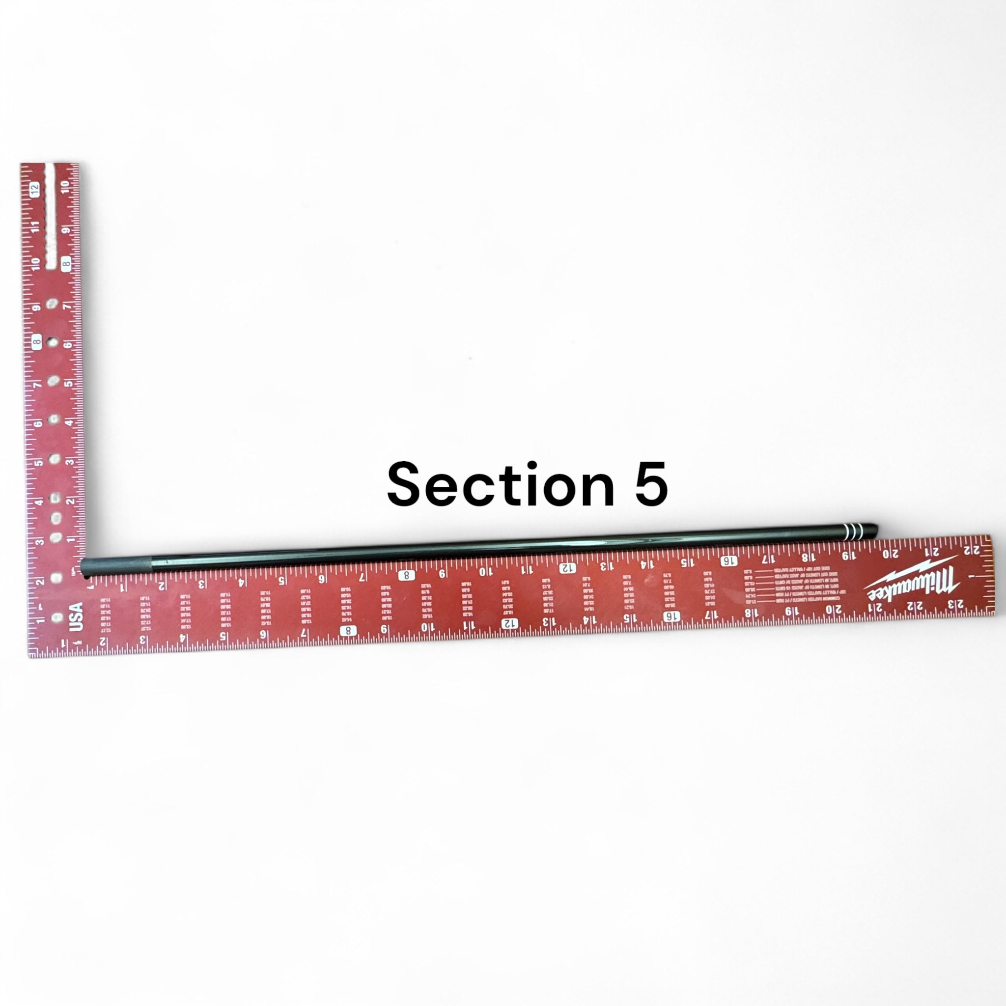 Replacement Section 5 for the Wasatch Tenkara Rods RodZilla, shown next to a red Milwaukee square ruler for scale—precision-engineered for a perfect fit and continued performance in multi-section tenkara rod setups.