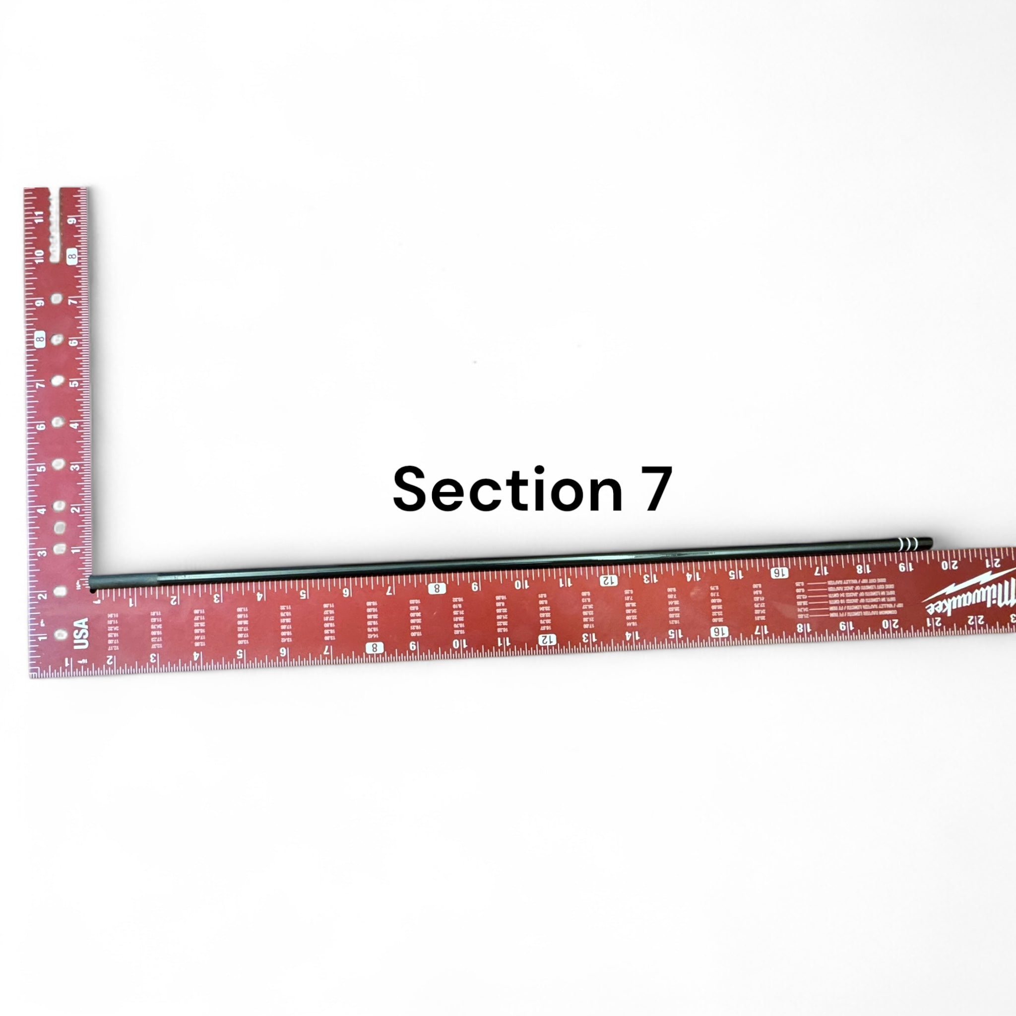 Replacement Section 7 for the Wasatch Tenkara Rods RodZilla, shown next to a red Milwaukee square ruler for scale—precision-engineered for a perfect fit and continued performance in multi-section tenkara rod setups.