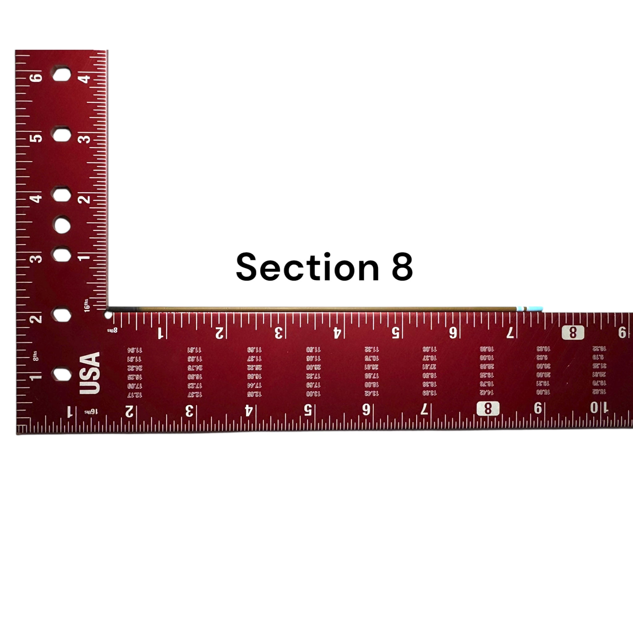 Section 8 of the Wasatch Tenkara Rods Snub Nose IV placed against a red measuring square for size reference, showing custom color banding and precision fit design for modular rod construction.