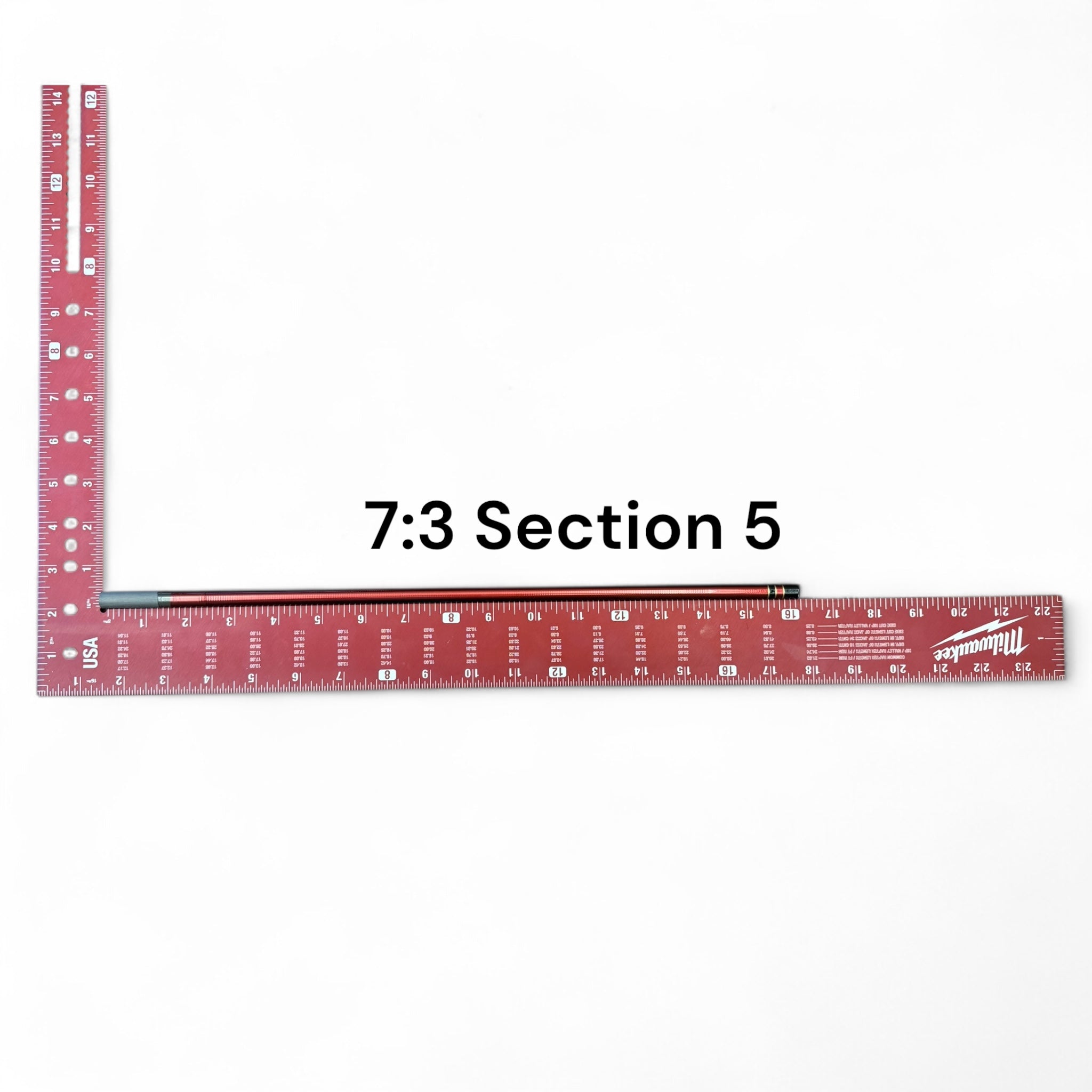 Image of the Akai Samurai Tenkara Rod’s Section 5 with 7:3 action, laid next to a red Milwaukee ruler for scale on a white background, labeled for identification.