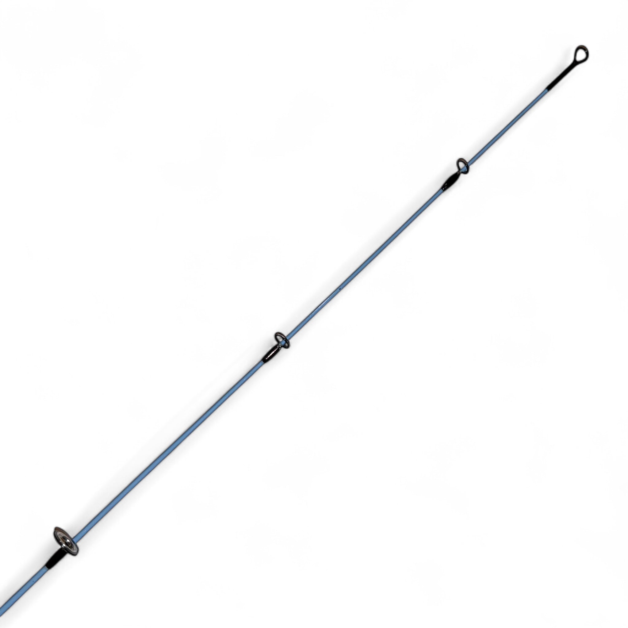Close-up of the tip section of a Wasatch Tenkara ice rod, showcasing a light blue carbon fiber blank with precision-aligned black line guides—designed for sensitivity and smooth line flow.