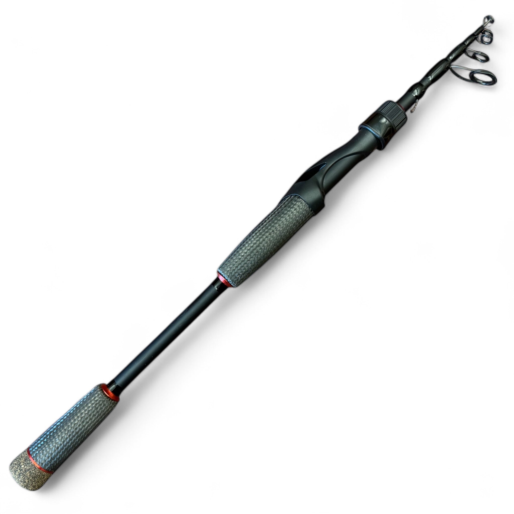 Close-up angled view of the Wasatch Tenkara Rods Command Force spin rod, featuring a telescopic design and textured carbon fiber grip for enhanced control and portability in freshwater fishing applications.