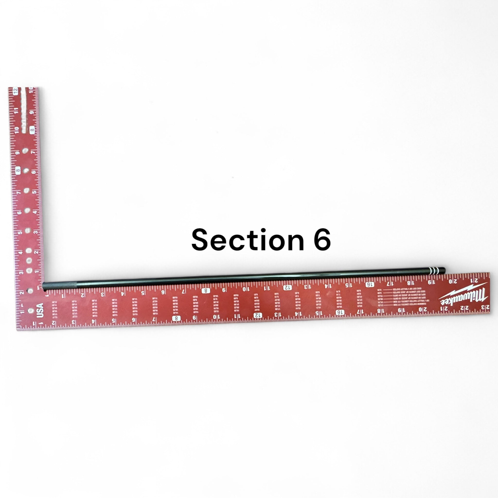 Replacement Section 6 for the Wasatch Tenkara Rods RodZilla, shown next to a red Milwaukee square ruler for scale—precision-engineered for a perfect fit and continued performance in multi-section tenkara rod setups.