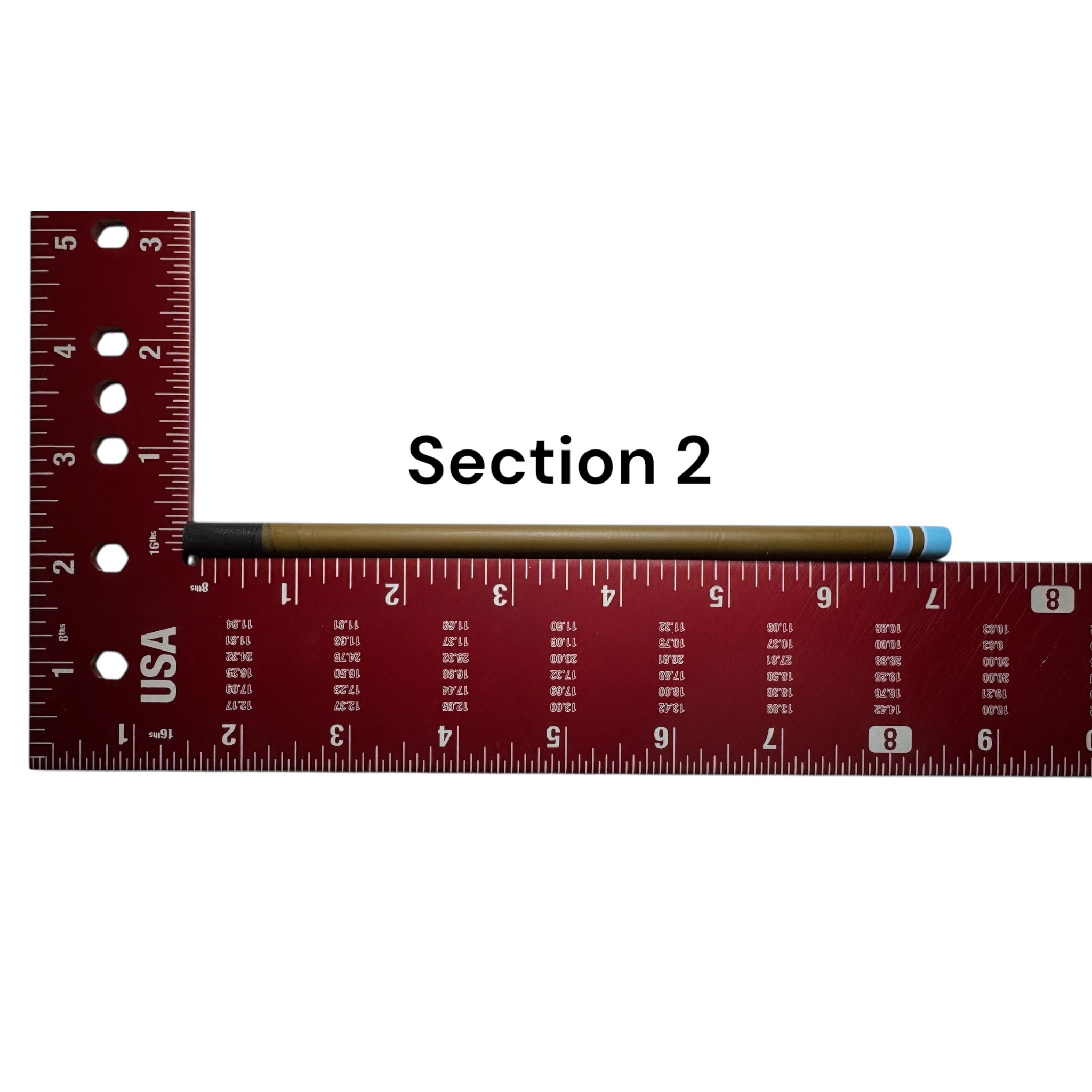 Section 2 of the Wasatch Tenkara Rods Snub Nose IV placed against a red measuring square for size reference, showing custom color banding and precision fit design for modular rod construction.
