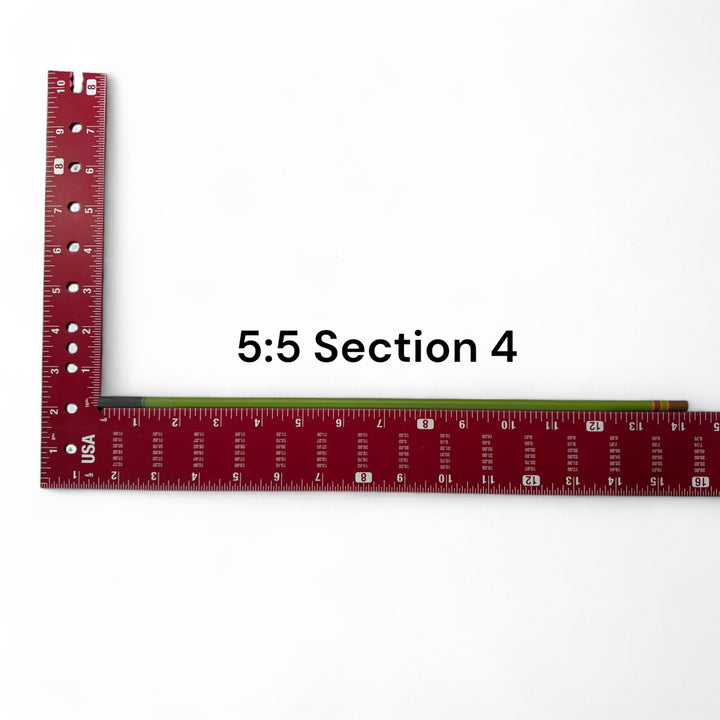 Wasatch Tenkara Rods Baby RodZilla 5:5 Section 4 replacement part shown against a measuring square for scale—green carbon fiber rod segment for ultralight tenkara fly fishing rod repair.
