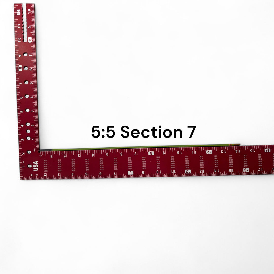 Wasatch Tenkara Rods Baby RodZilla 5:5 Section 7 replacement part shown against a measuring square for scale—green carbon fiber rod segment for ultralight tenkara fly fishing rod repair.