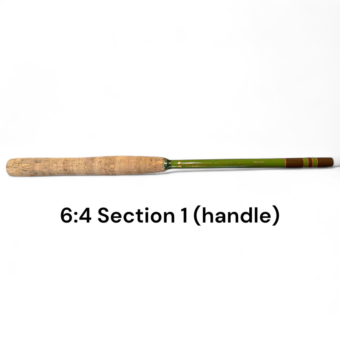 Close-up of Section 1 handle for the Wasatch Tenkara Rods Baby RodZilla, featuring a 6:4 action cork grip and green carbon fiber rod blank—replacement part for ultralight tenkara fishing rod.