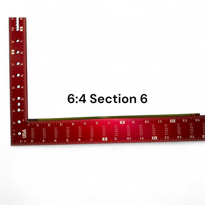 Wasatch Tenkara Rods Baby RodZilla 6:4 Section 6 replacement part shown against a measuring square for scale—green carbon fiber rod segment for ultralight tenkara fly fishing rod repair.